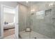 Stylish bathroom shower featuring glass enclosure and tiled walls with niche at 364 Glendale Ne Ave # B, Atlanta, GA 30307
