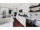 Gourmet kitchen featuring stainless appliances, wine cooler, and ample counter space at 944 Hidden Falls Se Ln, Smyrna, GA 30082