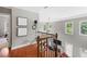 Spacious loft area with hardwood floors, natural light, and a view of the lower level at 944 Hidden Falls Se Ln, Smyrna, GA 30082