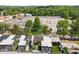 View of modern townhomes with rooftop patios and well-manicured green spaces offering urban living at 1225 Chelsea Nw Cir, Atlanta, GA 30318