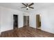 A clean bedroom features hardwood floors, with access to closet and bathroom at 1225 Chelsea Nw Cir, Atlanta, GA 30318