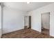 The bedroom has hardwood floors and access to a bathroom at 1225 Chelsea Nw Cir, Atlanta, GA 30318