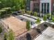Community dog park offers a spacious, fenced area with shade trees and seating for residents and pets at 1225 Chelsea Nw Cir, Atlanta, GA 30318