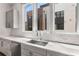 Kitchen features stainless steel appliances, modern countertops, and gray cabinets at 1225 Chelsea Nw Cir, Atlanta, GA 30318