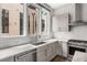 Kitchen with modern countertops, cabinetry and stainless steel appliances at 1225 Chelsea Nw Cir, Atlanta, GA 30318