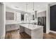 The kitchen includes modern cabinets, stainless steel appliances, and a stone countertop island at 1225 Chelsea Nw Cir, Atlanta, GA 30318