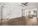 Open living room featuring hardwood floors and views into kitchen at 1225 Chelsea Nw Cir, Atlanta, GA 30318