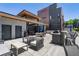Inviting patio with outdoor seating, grill, and modern design elements, perfect for relaxing and entertaining at 1225 Chelsea Nw Cir, Atlanta, GA 30318