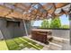 This relaxing rooftop patio offers a private hot tub and stylish pergola for your enjoyment at 1225 Chelsea Nw Cir, Atlanta, GA 30318