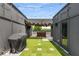 Relax on this spacious rooftop patio featuring an outdoor grill and hot tub for ultimate outdoor enjoyment at 1225 Chelsea Nw Cir, Atlanta, GA 30318