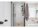 Modern bathroom with glass shower, soaking tub, and elegant fixtures at 1858 Perry Nw Blvd, Atlanta, GA 30318