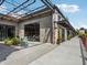 Outside view of a commercial building with a pedestrian walkway showcasing signage and landscaping at 1858 Perry Nw Blvd, Atlanta, GA 30318