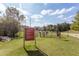Dog park with rules sign, walking path, and fenced-in area at 1858 Perry Nw Blvd, Atlanta, GA 30318
