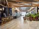A well-lit market interior with a bar, plants, and unique decorations, creating a welcoming experience at 1858 Perry Nw Blvd, Atlanta, GA 30318