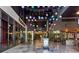 A vibrant marketplace setting with shops, restaurants, and colorful lighting for a fun and lively experience at 1858 Perry Nw Blvd, Atlanta, GA 30318