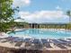 A community pool features a large deck with lounge chairs and a covered picnic area with seating at 1858 Perry Nw Blvd, Atlanta, GA 30318