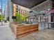 A modern restaurant featuring a stylish bar, outdoor seating and a lively ambiance, perfect for social gatherings at 1858 Perry Nw Blvd, Atlanta, GA 30318