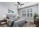 Cozy bedroom with a plush bed, elegant decor, and plantation shutters allowing soft, natural light at 901 Abernathy Ne Rd # 2050, Sandy Springs, GA 30328