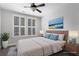 Bright bedroom with large windows, shutters, ceiling fan, and neutral decor at 901 Abernathy Ne Rd # 2050, Sandy Springs, GA 30328