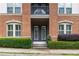 Charming brick apartment building featuring a small porch at 901 Abernathy Ne Rd # 2050, Sandy Springs, GA 30328