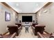 Cozy home theater room with comfortable leather seating and a large screen for immersive entertainment at 901 Abernathy Ne Rd # 2050, Sandy Springs, GA 30328