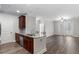 Kitchen features stainless steel appliances, granite countertops, dark cabinets, and an open floor plan at 901 Abernathy Ne Rd # 2050, Sandy Springs, GA 30328