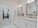 Bathroom with double sinks, modern finishes, and marble floors at 1815 La Dawn Nw Ln, Atlanta, GA 30318