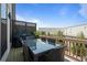 Outdoor dining on spacious deck with glass table, ideal for entertaining at 1815 La Dawn Nw Ln, Atlanta, GA 30318