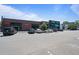 Street view of commercial area with multiple stores and ample parking spaces at 1815 La Dawn Nw Ln, Atlanta, GA 30318