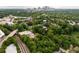 Panoramic aerial view of the neighborhood with the city skyline in the distance at 230 Milton Se Ave, Atlanta, GA 30315