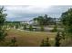 Scenic view of the community with modern townhomes overlooking a pond and walking paths at 230 Milton Se Ave, Atlanta, GA 30315