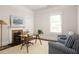 Charming office with fireplace, natural light, and comfortable seating area at 230 Milton Se Ave, Atlanta, GA 30315