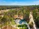 Scenic aerial view of the green space, park and amphitheater, with a skyline in the distance at 4679 Glenshire Pl, Atlanta, GA 30338