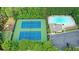 Aerial shot of tennis courts and a community pool offering recreational opportunities at 4679 Glenshire Pl, Atlanta, GA 30338