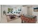 Inviting recreation room with a foosball table and a comfortable seating area at 4679 Glenshire Pl, Atlanta, GA 30338