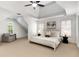 Spacious main bedroom with tray ceiling, neutral carpet, and abundant natural light at 4679 Glenshire Pl, Atlanta, GA 30338