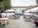 Outdoor seating area with tables and chairs, perfect for dining or socializing in a relaxed atmosphere at 4679 Glenshire Pl, Atlanta, GA 30338