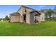 Two-story brick house with a covered patio and well-manicured lawn for outdoor enjoyment at 81 Homesite Hartsfield Rd, Mcdonough, GA 30253