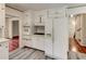 Kitchen featuring white cabinets and appliances at 3539 Evans Mill Rd, Lithonia, GA 30038