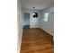 Bright dining room featuring modern lighting, beautiful hardwood floors, and freshly painted walls at 4103 Laynewood, Tucker, GA 30084