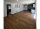 Open-concept living room with hardwood floors and neutral paint, perfect for entertaining and relaxing at 4103 Laynewood, Tucker, GA 30084