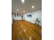Open living room features hardwood floors, recessed lights, and wall art creating an inviting atmosphere at 4103 Laynewood, Tucker, GA 30084