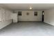 A covered outdoor patio is perfect for entertaining, with a refrigerator and decorative compass at 4103 Laynewood, Tucker, GA 30084