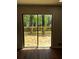 Sliding door with access to a new wood deck overlooking a lush green backyard at 4103 Laynewood, Tucker, GA 30084
