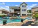 Spacious backyard with a pool, hot tub, deck, and patio, designed for relaxing outdoor living and entertaining at 4388 Cades Pointe, Marietta, GA 30066