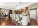 Kitchen features bar seating, granite countertops, custom cabinets, and stainless steel appliances at 4388 Cades Pointe, Marietta, GA 30066