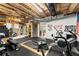 Functional basement gym space with exercise equipment and ample room to move at 4388 Cades Pointe, Marietta, GA 30066