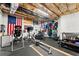 Home gym in basement with a variety of exercise equipment and weights at 4388 Cades Pointe, Marietta, GA 30066