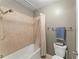 Bathroom includes a tiled shower with a shower head and a toilet with towel rack at 4388 Cades Pointe, Marietta, GA 30066