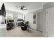 Spacious bedroom with neutral carpet, built-in storage, ceiling fan, and desk for a functional workspace at 4388 Cades Pointe, Marietta, GA 30066